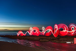 Lenovo ThinkPad X1 Carbon Default Wallpaper with Red Light Painting on a Beach at Dusk HD wallpaper