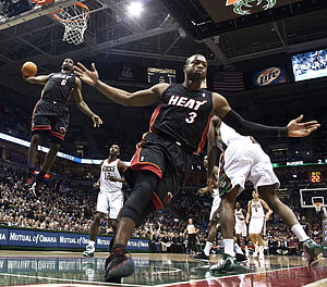 LeBron James and Dwyane Wade in Miami Heat Black Jerseys During NBA Game HD wallpaper