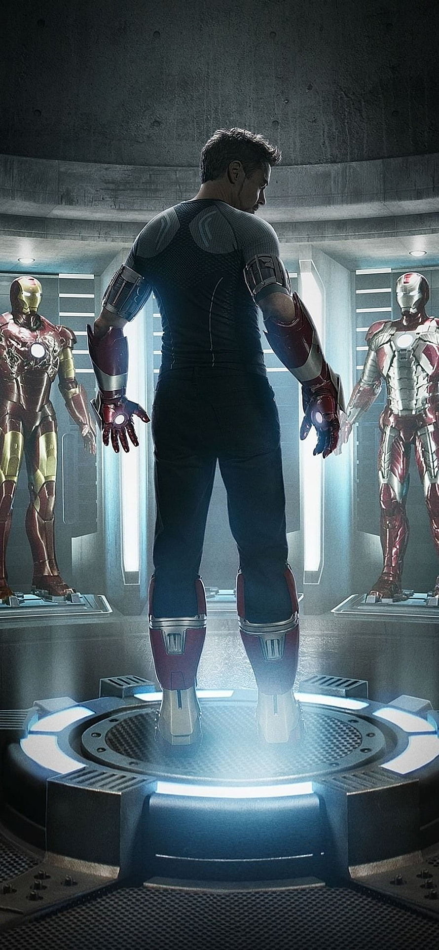 Iron Man in the Hall of Armor with Mark 1 and Mark 2 Suits HD phone wallpaper