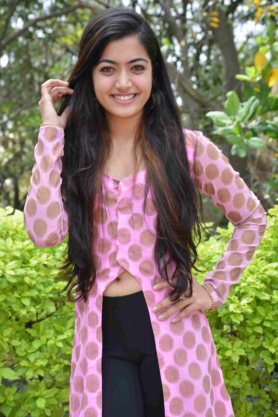 Rashmika Mandanna in a pink polka dot kurta with black leggings outdoors HD phone wallpaper