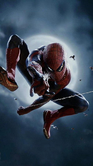 The Amazing Spider-Man Swinging Through a Dark Stormy Sky HD phone wallpaper