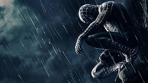 Black Spider-Man Crouching in Heavy Rain with Dark Moody Atmosphere HD wallpaper