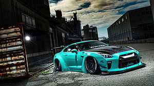 Turquoise Nissan GT-R R35 Rohana Widebody in Industrial Setting HD wallpaper