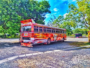 Weli Rajini Bus in Sri Lanka: Vibrant Red and Orange Public Transport Vehicle HD wallpaper