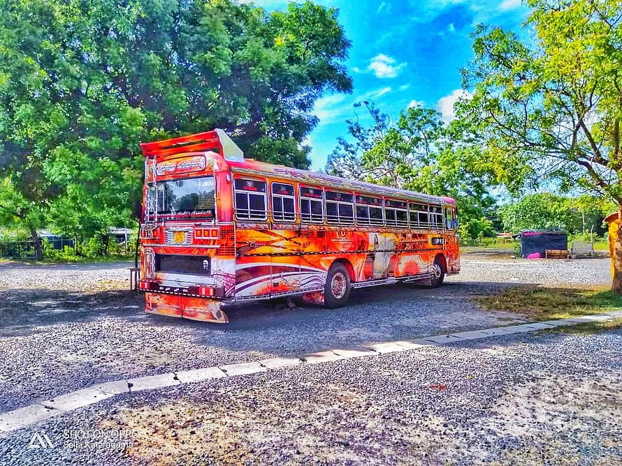 Weli Rajini Bus in Sri Lanka: Vibrant Red and Orange Public Transport Vehicle HD wallpaper