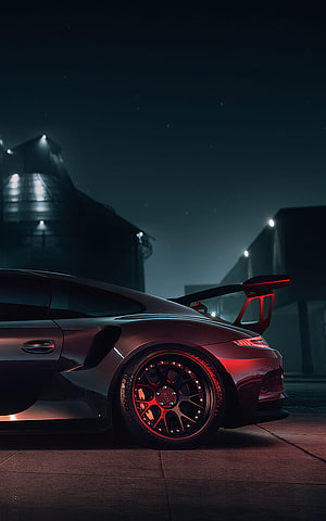 Porsche 911 GT3 RS Night Scene with Red Underglow and Industrial Backdrop HD phone wallpaper