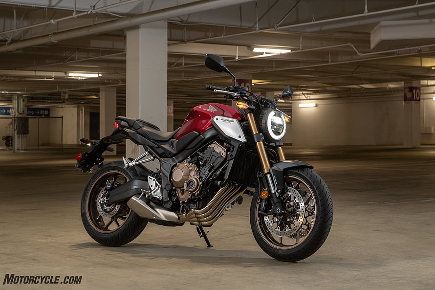 Red Honda CB650R Neo Sports Cafe Motorcycle Parked in Underground Garage HD wallpaper