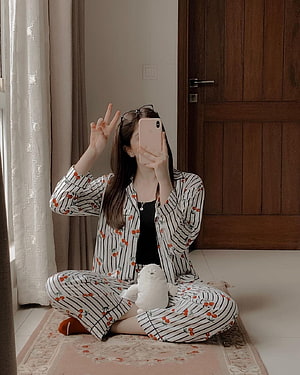 Woman in striped cherry pajamas taking a mirror selfie with a plush toy, Girl Hidden Face DP with Mobile in 2021, girl mobile hidden face HD phone wallpaper