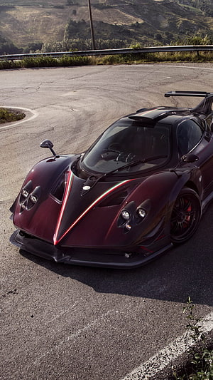 Pagani Zonda R Hypercar on Mountain Road with Carbon Fiber Body and Italian Racing Stripes HD phone wallpaper