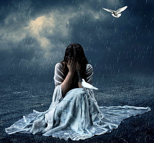 Woman in White Gown Crying in the Rain with Doves Under Stormy Sky HD wallpaper