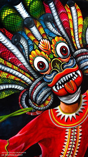 Vibrant Sri Lankan Yaka Demon Mask with Serpents and Traditional Folk Art HD phone wallpaper