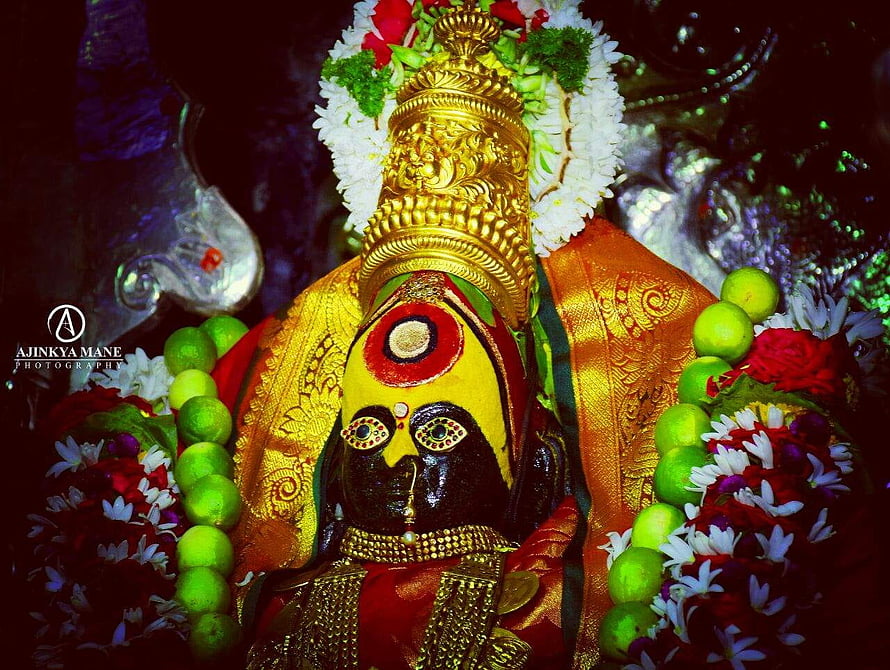 Tulja Bhavani Temple Deity Adorned With Gold Crown And Fresh Floral Garlands HD wallpaper