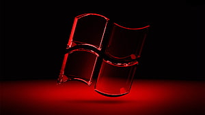 Glossy Red Windows Logo on Black Background with Dramatic Lighting HD wallpaper