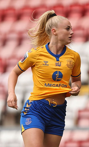 Alisha Lehmann in Everton Women's Yellow Away Kit on the Pitch HD phone wallpaper