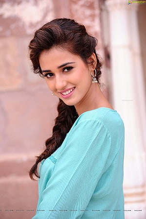 Disha Patani in a Turquoise Kurta with Braided Hair and Traditional Earrings HD phone wallpaper