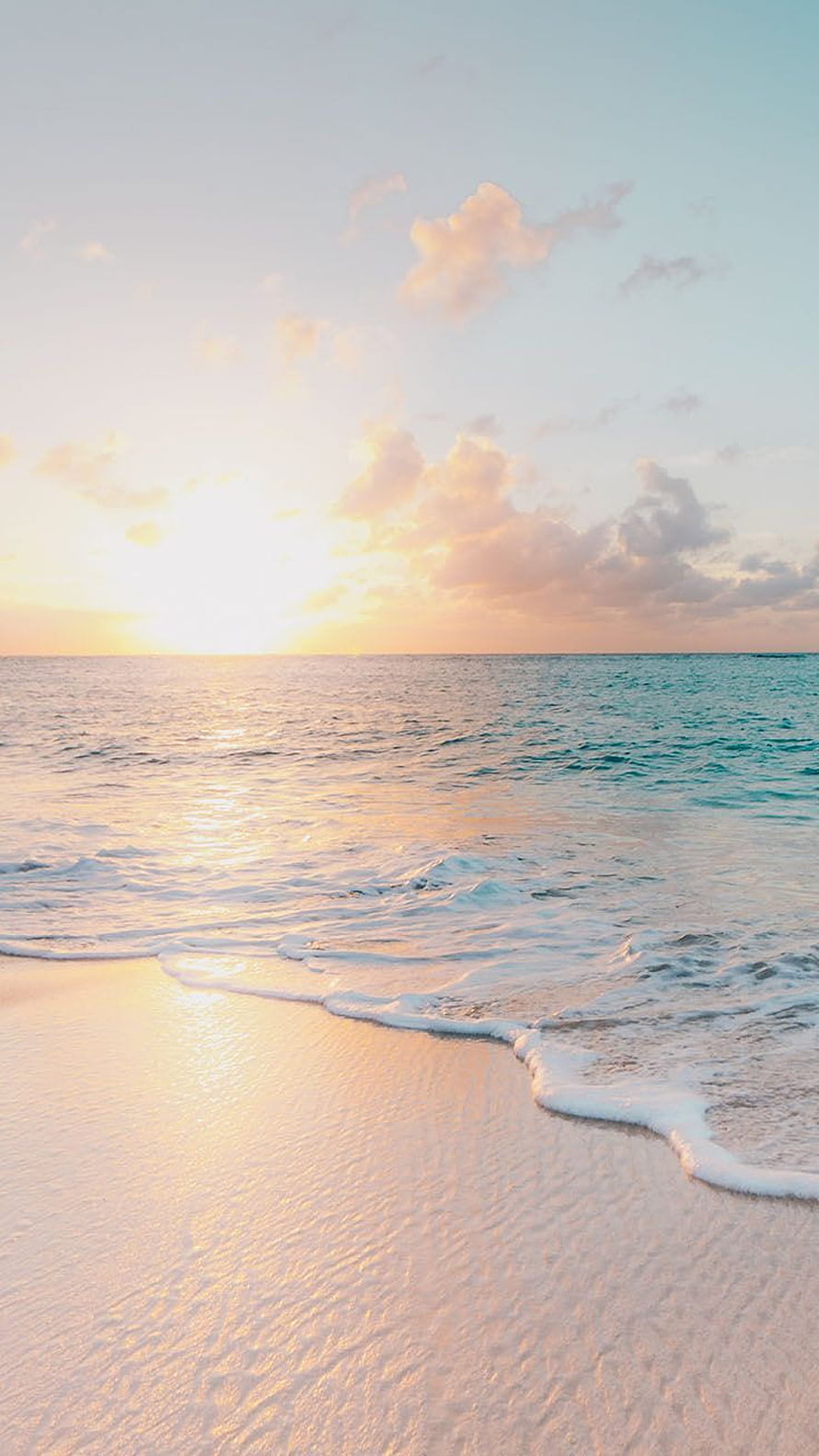 Serene Ocean Sunset Over White Sand Beach With Gentle Waves And Soft Golden Light HD phone wallpaper