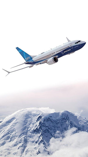 Boeing 737 MAX Airplane Cruising Above Snow-Capped Mountain Peaks HD phone wallpaper