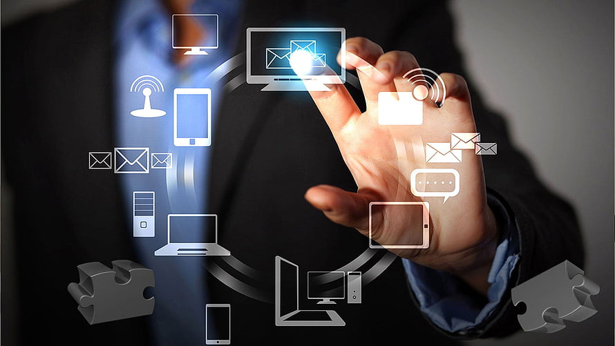 Businessman Interacting With Digital Connectivity Icons And Devices HD wallpaper