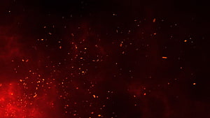Glowing Red Fire Particles and Embers Drifting Through Dark Smoke HD wallpaper