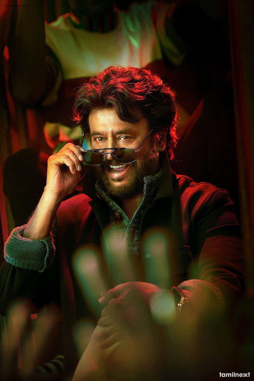 Rajinikanth in Petta Movie Still with Sunglasses and Dramatic Red Lighting HD phone wallpaper