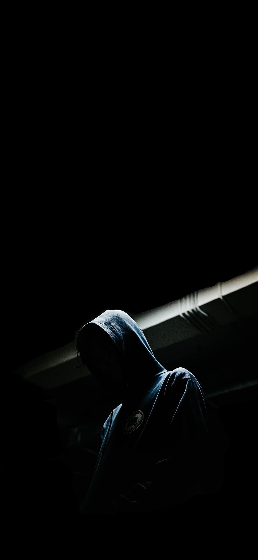 Moody Hooded Figure in Dramatic Low-Key Lighting HD phone wallpaper