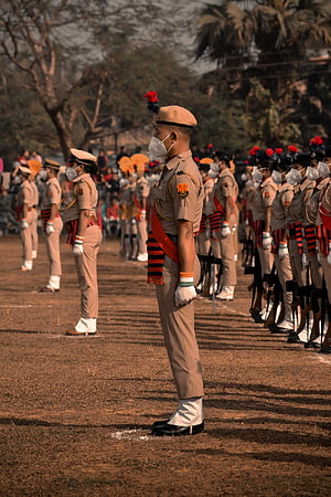Indian Police Officer Standing At Attention During Formal Parade Ceremony HD phone wallpaper