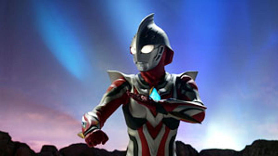 Ultraman Nexus Hero Standing in Dramatic Twilight Landscape HD wallpaper