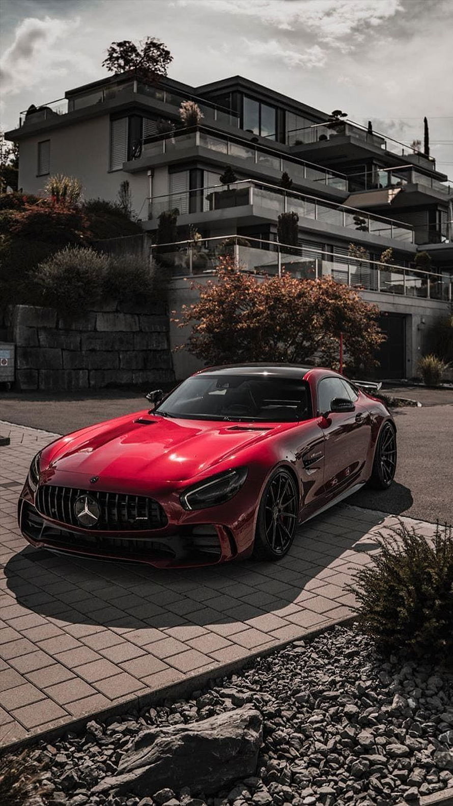 Red Mercedes-AMG GT R Parked in Front of Modern Luxury Villa HD phone wallpaper