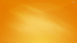 Warm Saffron and Amber Gradient with Soft Diagonal Light Streaks HD wallpaper