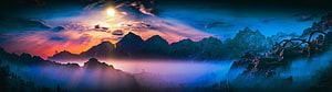 Vibrant Mountain Sunset with Misty Valleys and Dramatic Clouds HD wallpaper