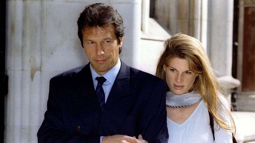 Imran Khan and a woman in formal attire standing together outdoors HD wallpaper