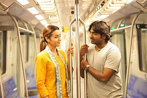 96 Movie Still: Man and Woman Sharing a Moment Inside a Metro Train Car, 96 Movie Stills, #96 movie HD wallpaper