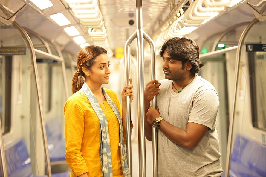 96 Movie Still: Man and Woman Sharing a Moment Inside a Metro Train Car HD wallpaper