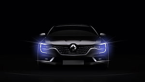 Renault Megane Front View With Glowing LED Headlights Against Dark Background HD wallpaper