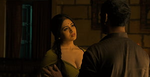 Sakshi Benipuri in Dramatic Scene with Man in Dimly Lit Room HD wallpaper