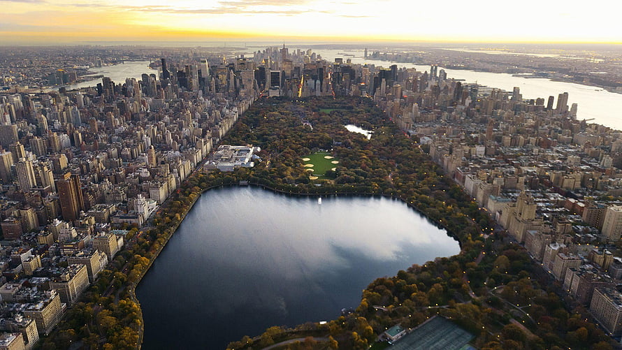 Aerial View of Central Park and the Manhattan Skyline at Golden Hour HD wallpaper