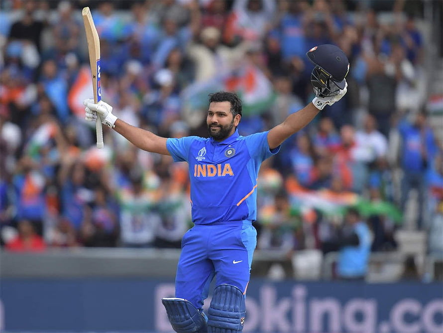 Rohit Sharma Celebrating a Milestone in India Cricket Jersey at World Cup HD wallpaper