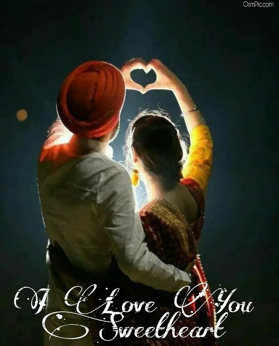 Romantic Indian Couple Forming Heart Shape With Hands Against Night Sky HD phone wallpaper