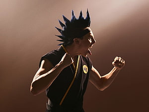 Miguel Diaz Cobra Kai Karate Fighter in Black Gi with Spiky Hair HD wallpaper