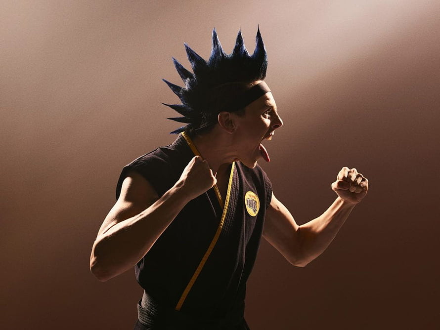 Miguel Diaz Cobra Kai Karate Fighter in Black Gi with Spiky Hair HD wallpaper