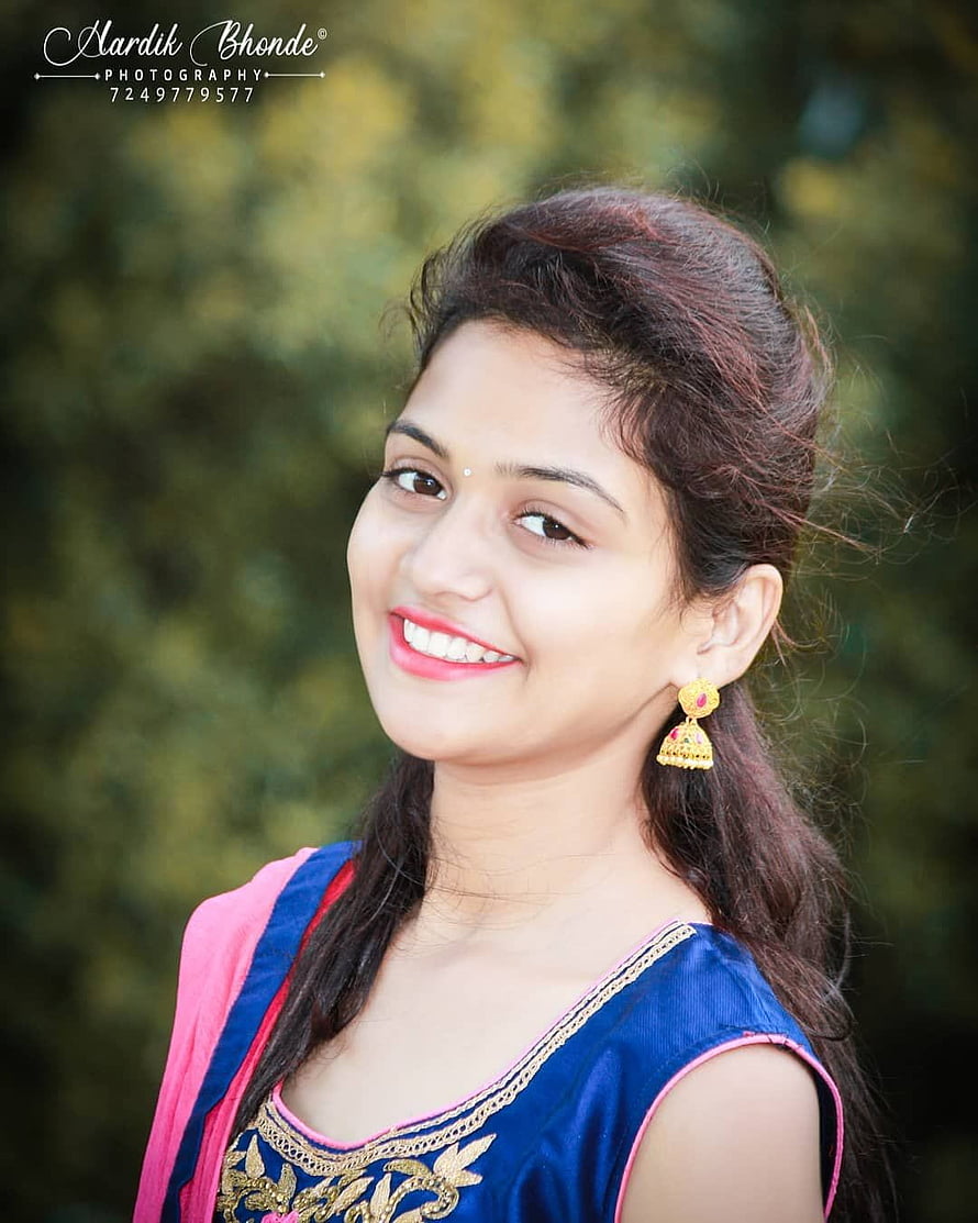 Smiling Indian Woman in Traditional Blue and Pink Ethnic Wear with Gold Jhumka Earrings HD phone wallpaper