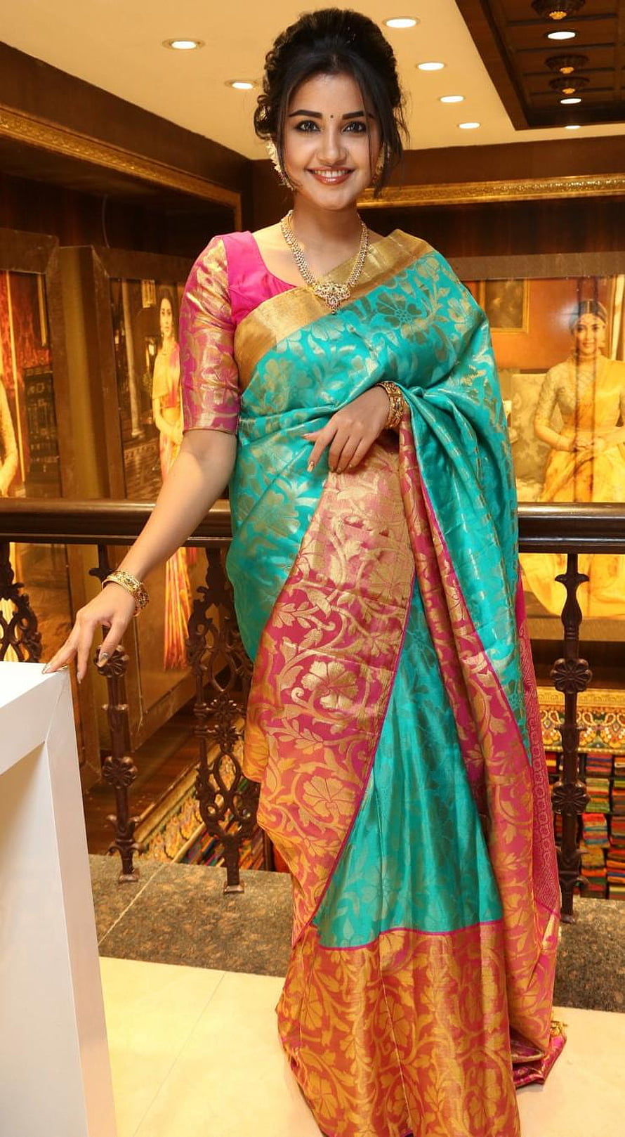 Anupama Parameswaran in a teal and pink silk saree with gold zari border HD phone wallpaper