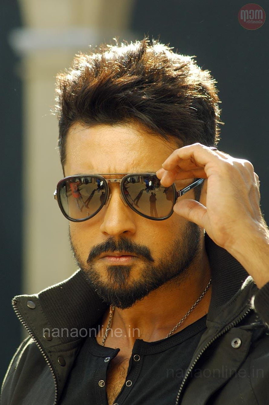 Surya in Anjaan wearing aviator sunglasses and black jacket HD phone wallpaper