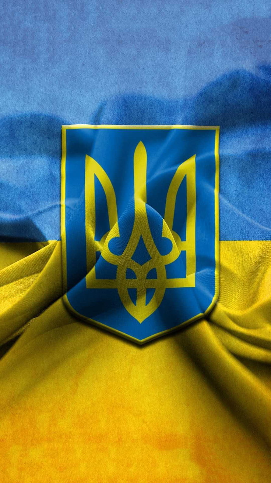 Ukrainian National Flag with Golden Trident Emblem on Waving Blue and Yellow Fabric HD phone wallpaper
