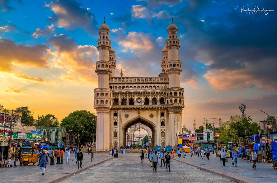 Charminar Monument in Hyderabad at Golden Hour with Dramatic Sunset Sky HD wallpaper