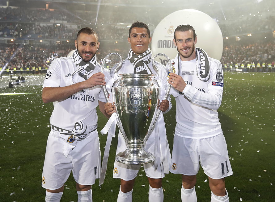 Real Madrid Champions: Cristiano Ronaldo, Karim Benzema, and Gareth Bale Lift the UEFA Champions League Trophy HD wallpaper