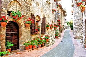 Charming Italian Stone Alleyway Lined With Vibrant Red Geraniums In Terracotta Pots HD wallpaper