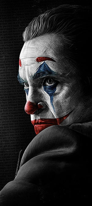 Joaquin Phoenix as the Joker in a dramatic monochrome portrait with red and blue clown makeup HD phone wallpaper