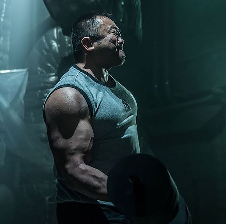 Ma Dong Seok Intense Gym Portrait in Dramatic Teal Lighting HD wallpaper