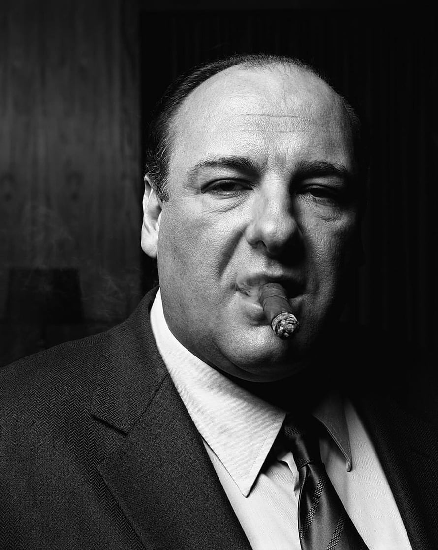 James Gandolfini in a dark suit holding a cigar in a dramatic black and white portrait HD phone wallpaper